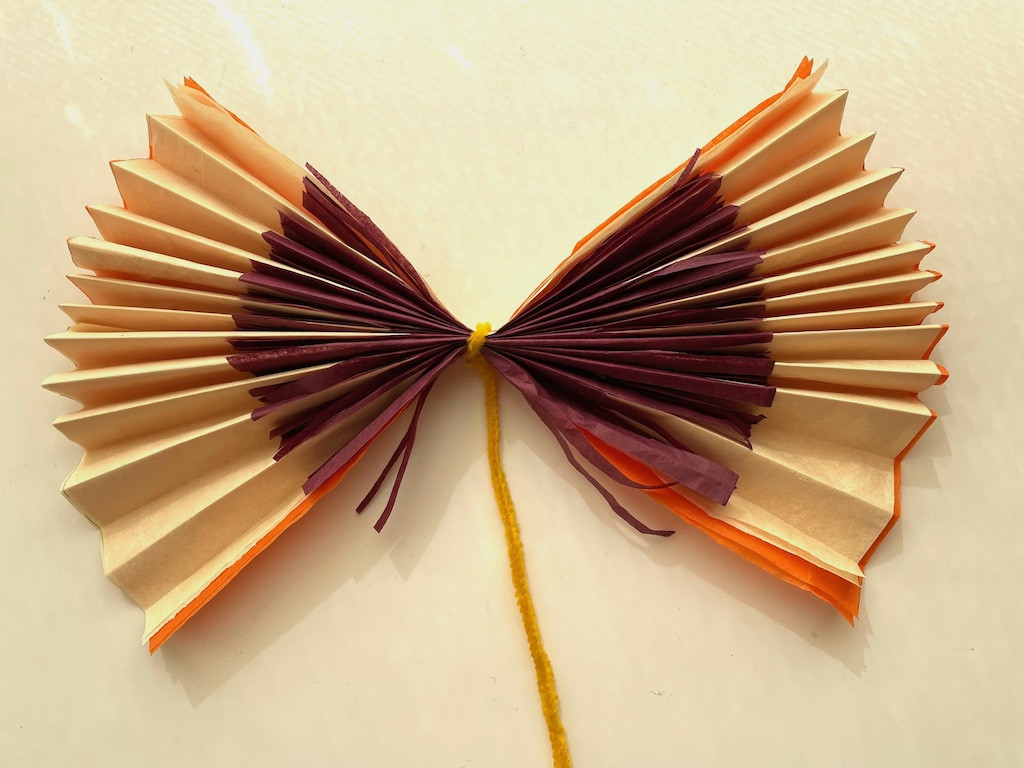 Close-up of accordion folding tissue paper