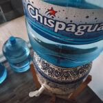 A man delivers a "garrafon" of purified water to a home in Mexico