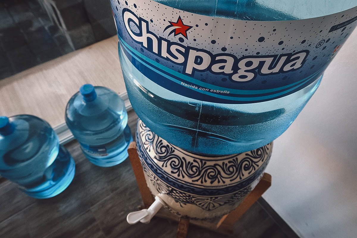 A close-up of a water dispenser in Mexico, highlighting the common practice of using purified water