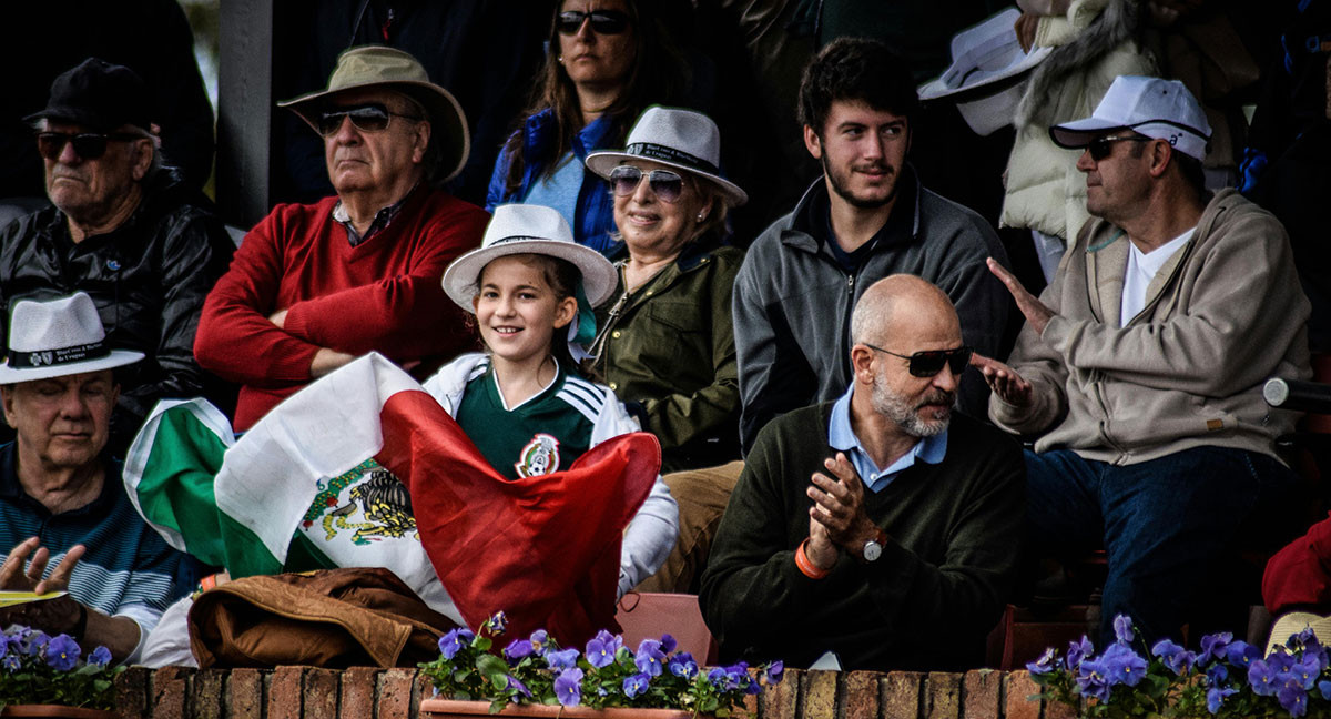 Crowd enjoying a festival in Mexico, showing diverse cultural experiences.