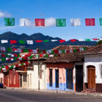 Colorful sarape blankets on display at a Mexican market