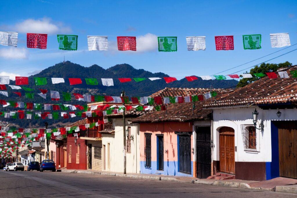 Colorful sarape blankets on display at a Mexican market