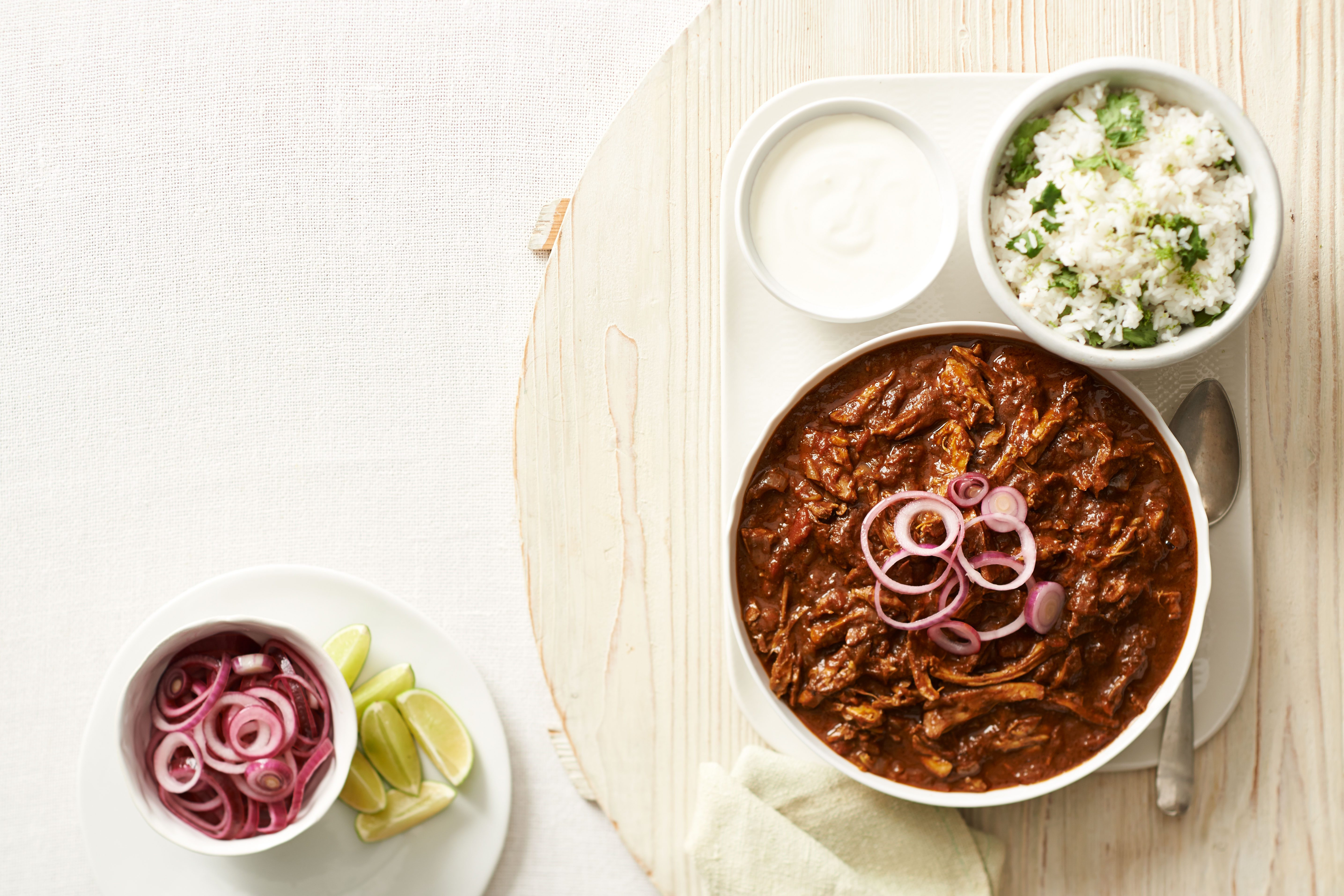 Dish of enchiladas with chicken and beans
