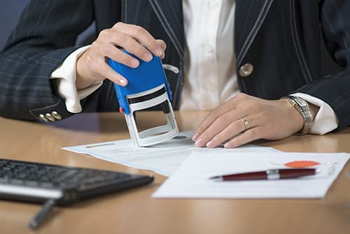 Notary public stamping letter of permission from a lender