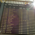 Departure board at Terminal 2 showing Lufthansa flights to European cities with scheduled times between 10:55-11:20.
