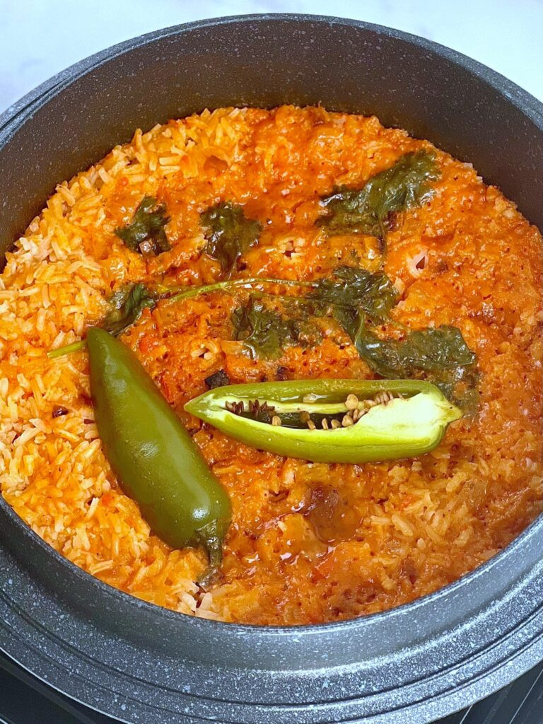 Close-up of perfectly cooked Mexican rice, showing separate grains and a light tomato coating