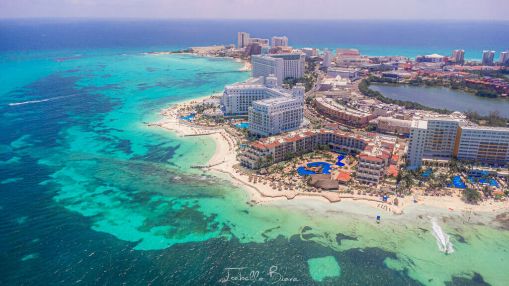 Aerial view of Punta Cancun, emphasizing the coastal beauty and safe environment for tourists.