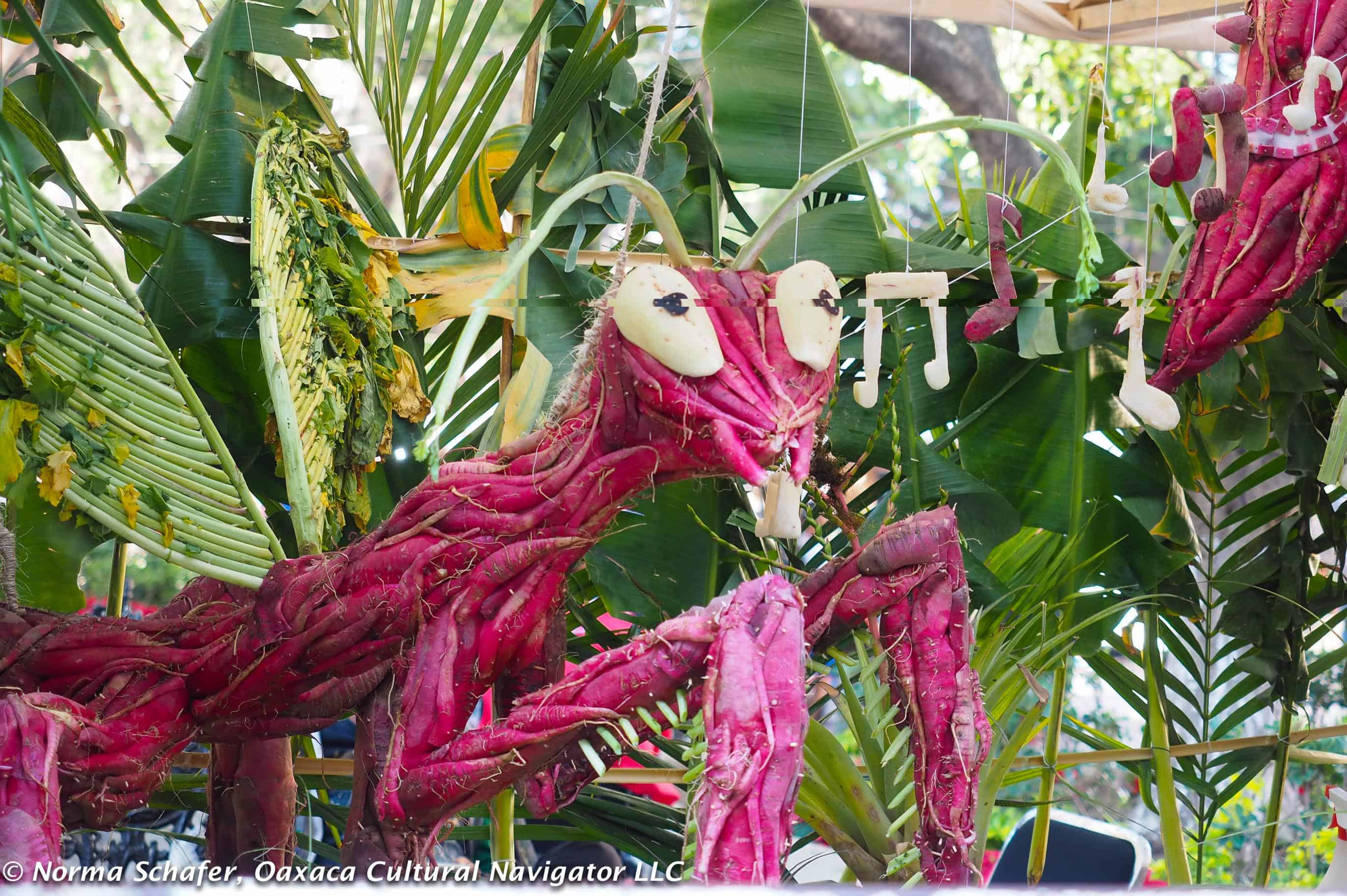 A contestant works on a radish carving during the Night of the Radishes