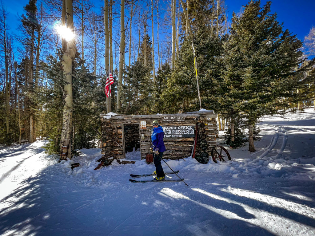 Moonstar Mining Camp in Red River, offering a family-fun spot on the hill with old buildings and neat signs