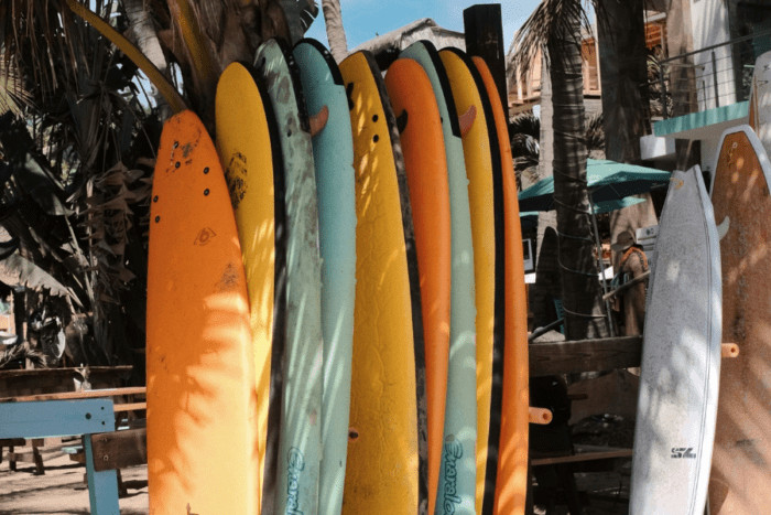 A picturesque view of Sayulita, Mexico, highlighting its vibrant beach culture and status as a safe and welcoming destination for surfers and nature enthusiasts