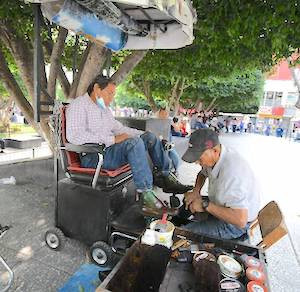 Shoe Shine stalls in Plaza Republica