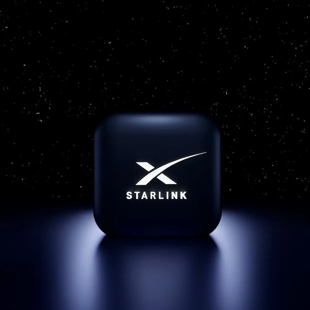 Starlink dish installed on a rooftop in Mexico, with a clear blue sky in the background