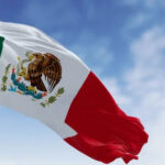 The Mexican coat of arms featuring an eagle on a cactus devouring a serpent, symbolizing the nation's heritage and strength
