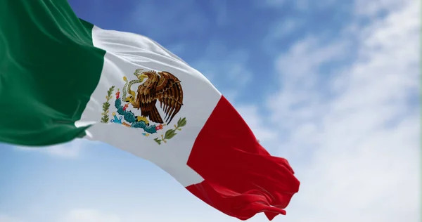 The Mexican coat of arms featuring an eagle on a cactus devouring a serpent, symbolizing the nation's heritage and strength