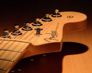 Fender Stratocaster Headstock - The iconic Fender logo on a Stratocaster headstock, a symbol of quality and craftsmanship.