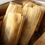Soaking corn husks for tamales de dulce to make them pliable