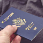 Newborn passport photo for international travel to Mexico representing family travel documents