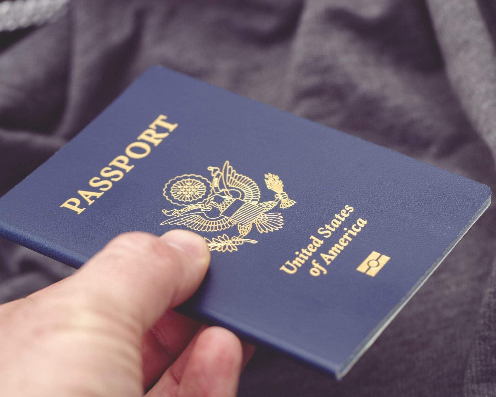 Newborn passport photo for international travel to Mexico representing family travel documents