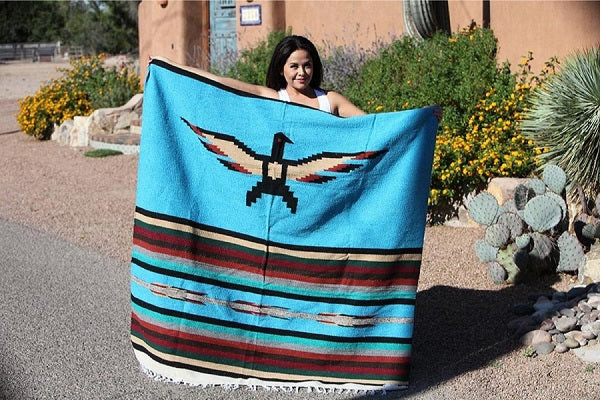 Turquoise Thunderbird Blanket with a prominent bird design