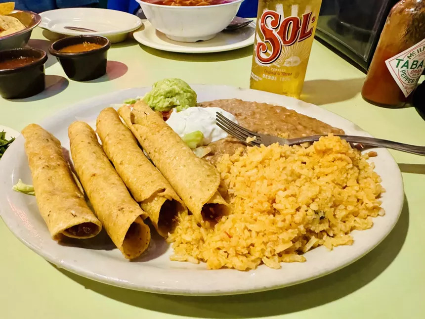 A flauta plate at Tipico's, showcasing delicious Tex-Mex cuisine with fresh ingredients and vibrant colors