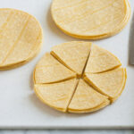 Cutting tortilla stacks into wedges
