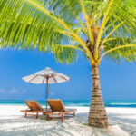 Couple enjoying a sunny day on the beach in Mexico