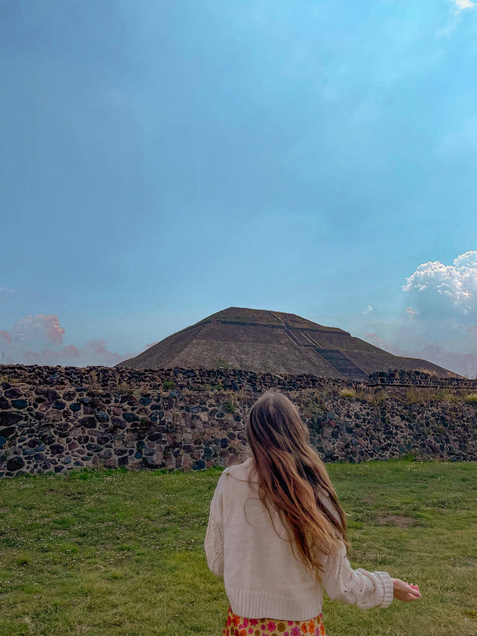 The pyramids in Teotihuacan Mexico surrounded by open area and other small structures