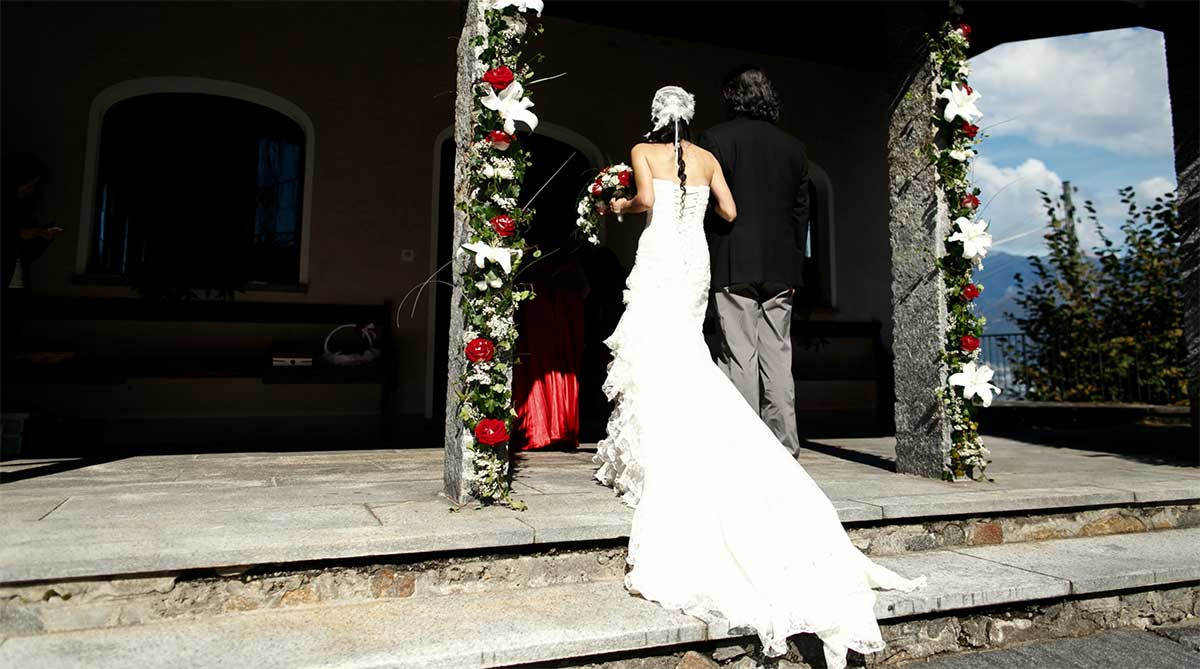 Groom giving wedding rings at a Mexican Wedding