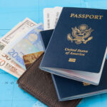 Essentials for a 7-day cruise to Mexico including a US passport, boarding pass, wallet, and mixed currency displayed on a map.
